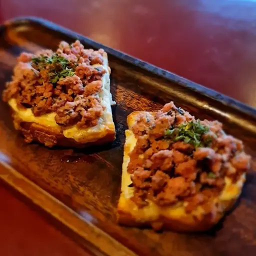 Bruschetta with Italian Sausage and Mozzarella Cheese